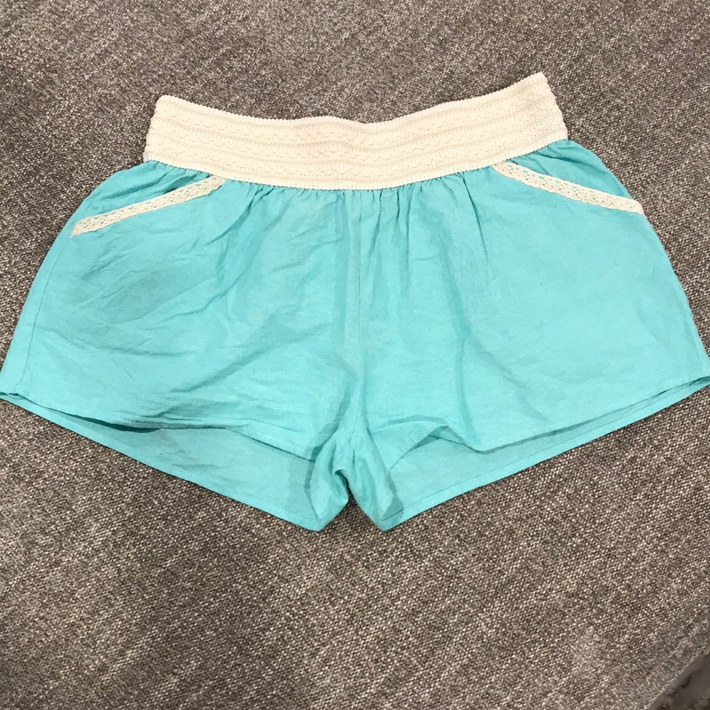 Turquoise shorts size Large.